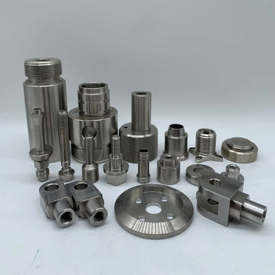 Способность бронзового материала CNC точное поворотное и фрезерное приспособление запасной композит